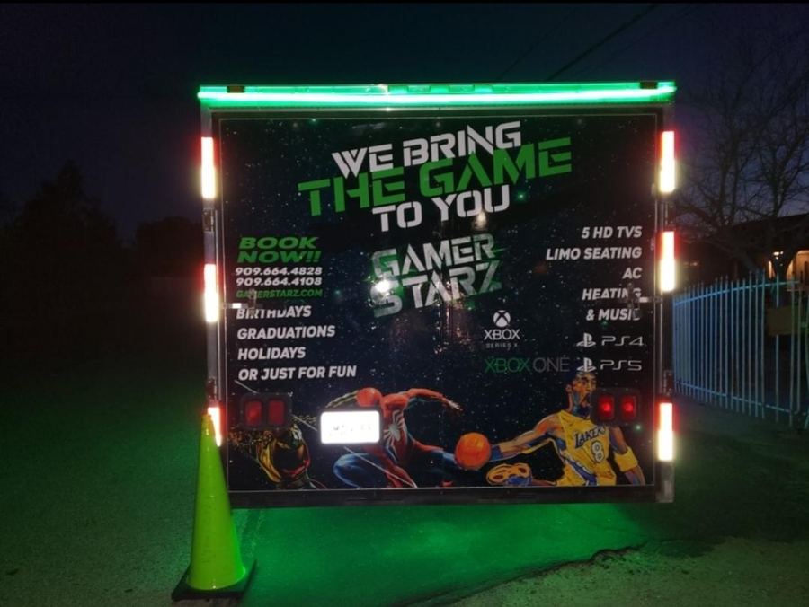 Mobile game truck interior with retro arcade classics